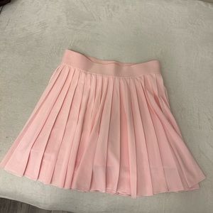 TNA Aritzia pink tennis skirt size small